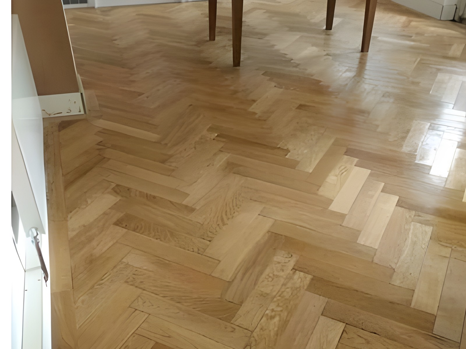 Herringbone parquet wood flooring laid and sanded in a London home