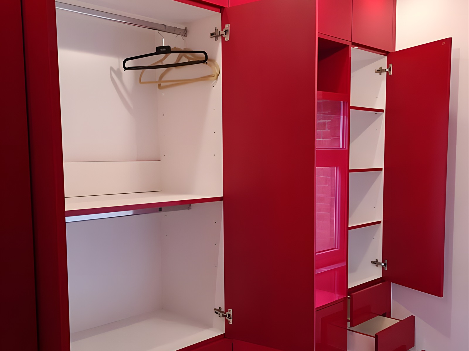 Red gloss wardrobe interior — bespoke joinery project in London